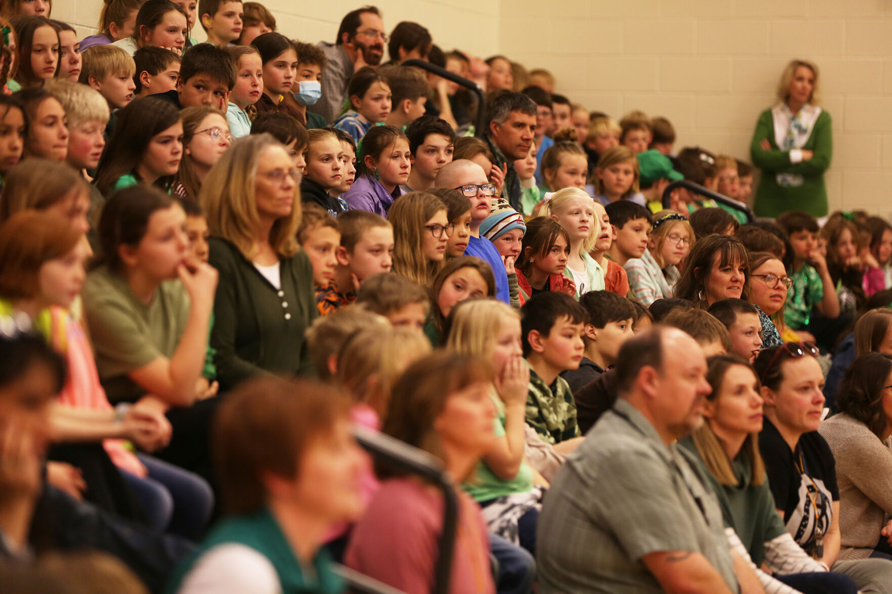 Cloud Peak Elementary students, teachers and parents quietly listen